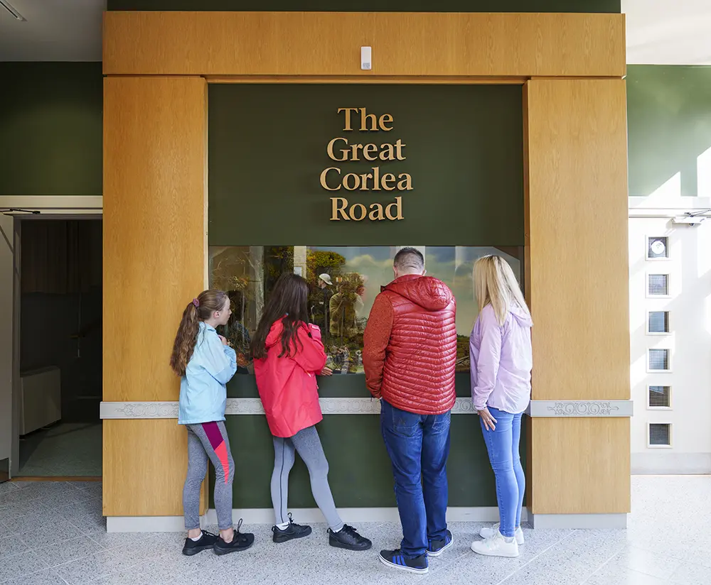 A family standing beside The Great Corlea Road